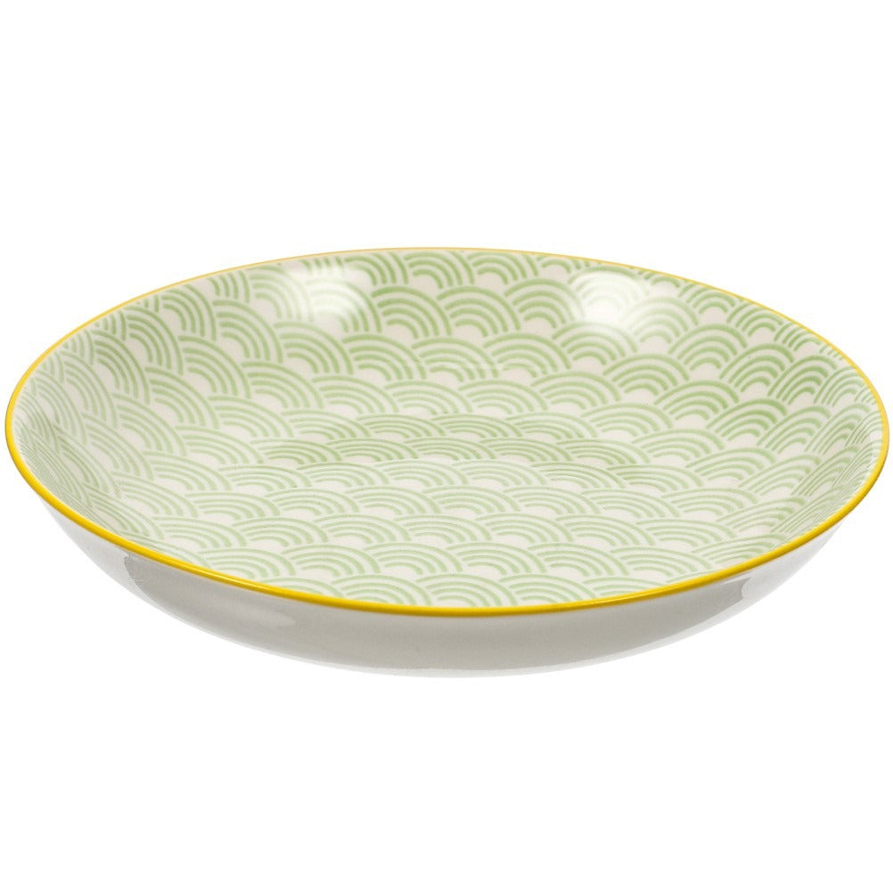 Assiette en céramique vert clair ondulée