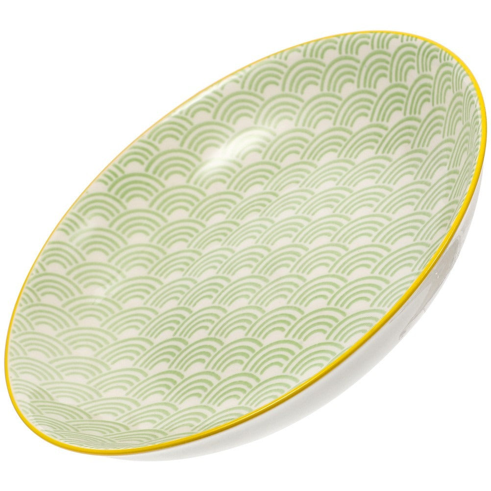 Assiette en céramique vert clair ondulée
